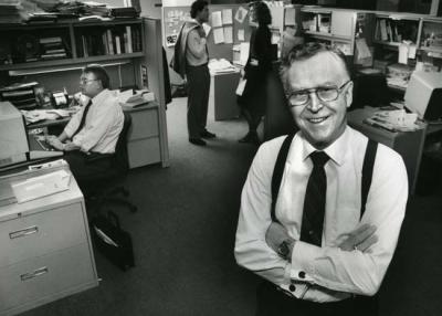 John Finnegan stands in the Pioneer Press newsroom in 1988. (Pioneer Press file photo) 