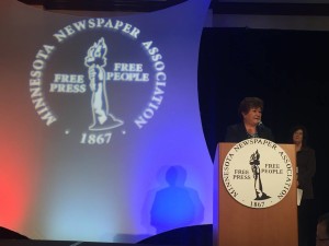 Dr. Kathleen Annette, president of the Blandin Foundation, accepts the 2016 Friend of Minnesota Newspapers Award
