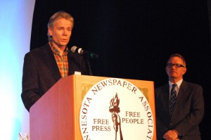 Marshall Helmberger accepts a 2013 Friend of Minnesota Newspapers Award.